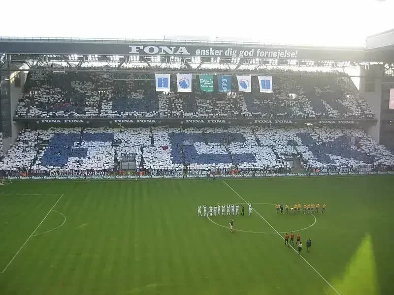 FC Copenhagen fans displaying 'FCK' tifo in stadium stands