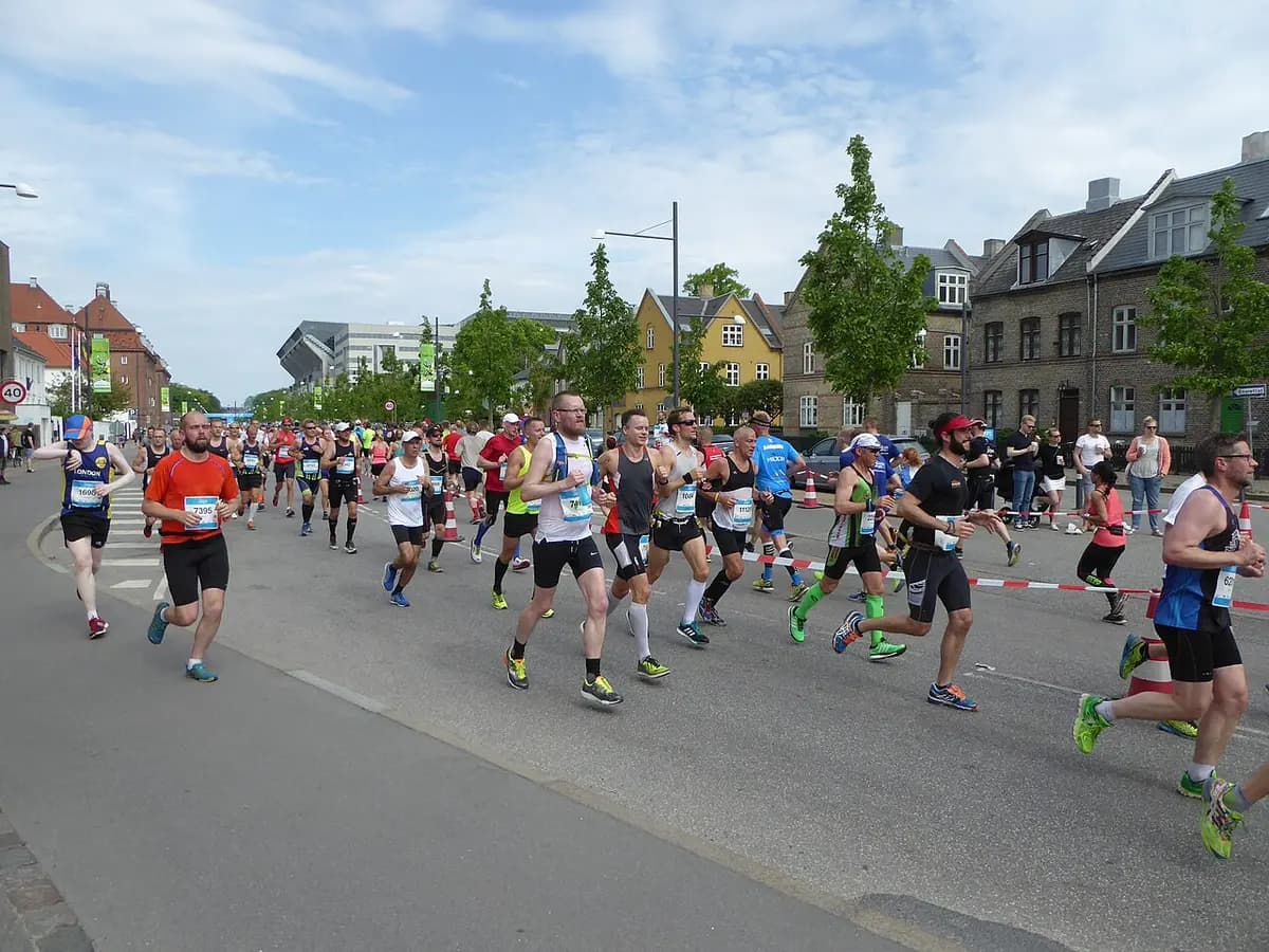 Runners in Copenhagen Marathon 2016 on city street