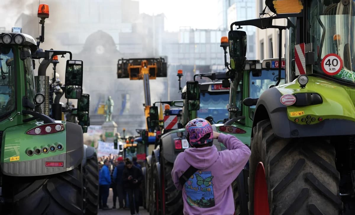 Tractors lined up on a city street during a farmers' protest