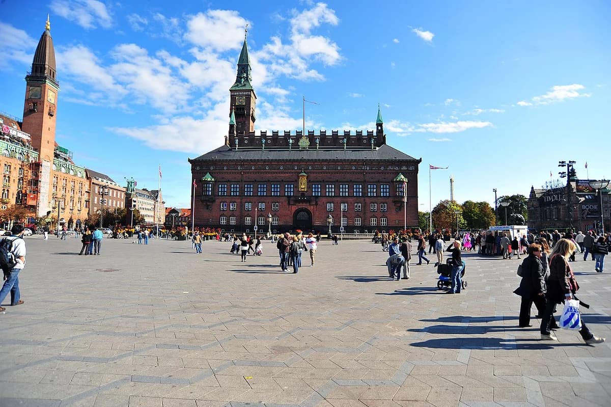 Rådhuspladsen square in Copenhagen with City Hall and crowds