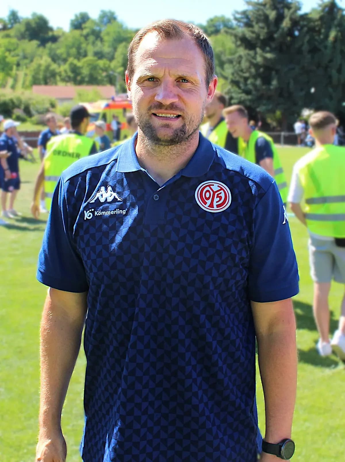 Bo Svensson in Mainz 05 polo shirt outdoors